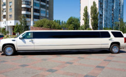 White Wedding Limousine. Ornated with flowers.